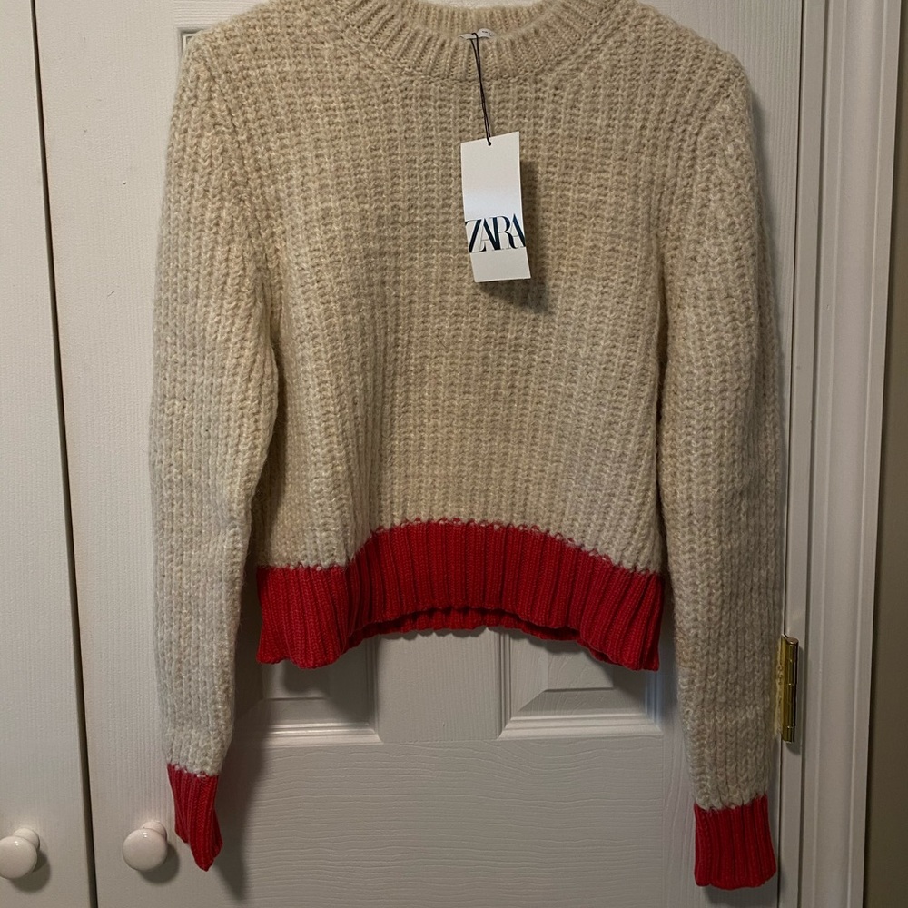 Red and cream sweater